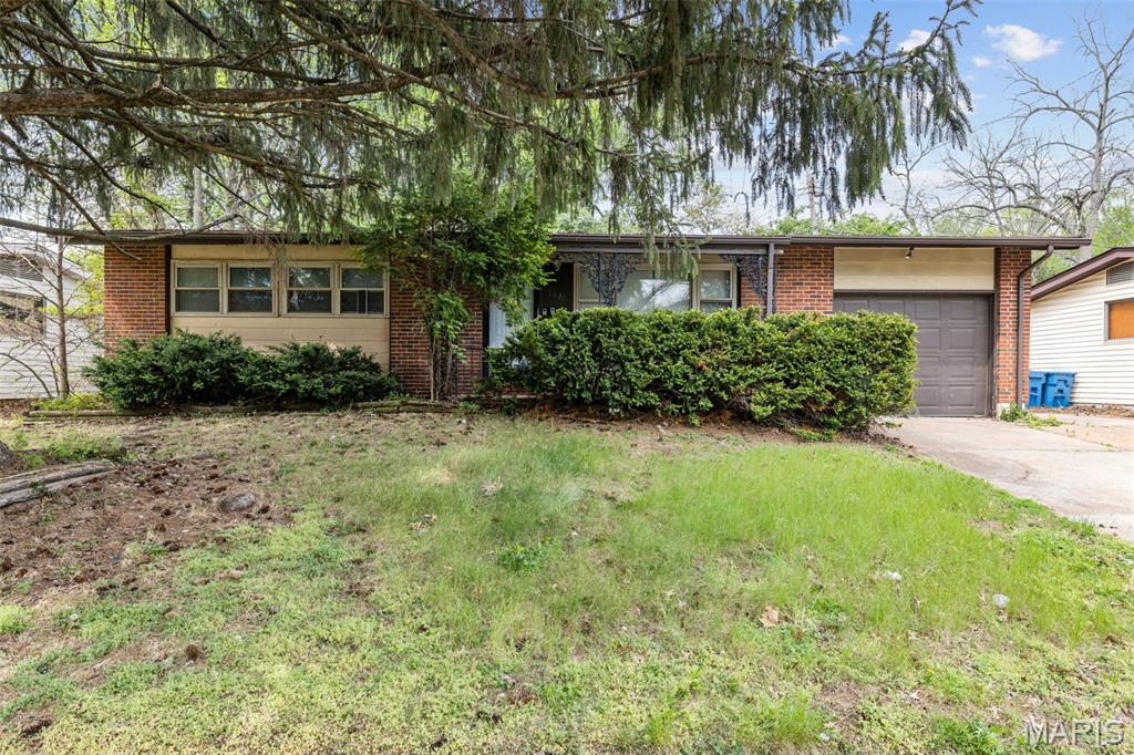 New price and open house Saturday 6/27 from 12-2pm! Looking for an updated ranch in a quiet neighborhood?  Look no further.  Property offers new flooring throughout and neutral paint, newly installed kitchen cabinets and countertops in the eat in kitchen, and updated bathroom with tub/shower combo.  Featuring 3 bedrooms and a full bath on the main floor, as well as a full partially finished basement with laundry.  The backyard is fenced with a large concrete patio for entertaining, a covered front porch, and a double driveway.  This property was used as a steady income producing rental for over a decade and is now ready for its new owner, or can be converted back to a rental with Dellwood approval.