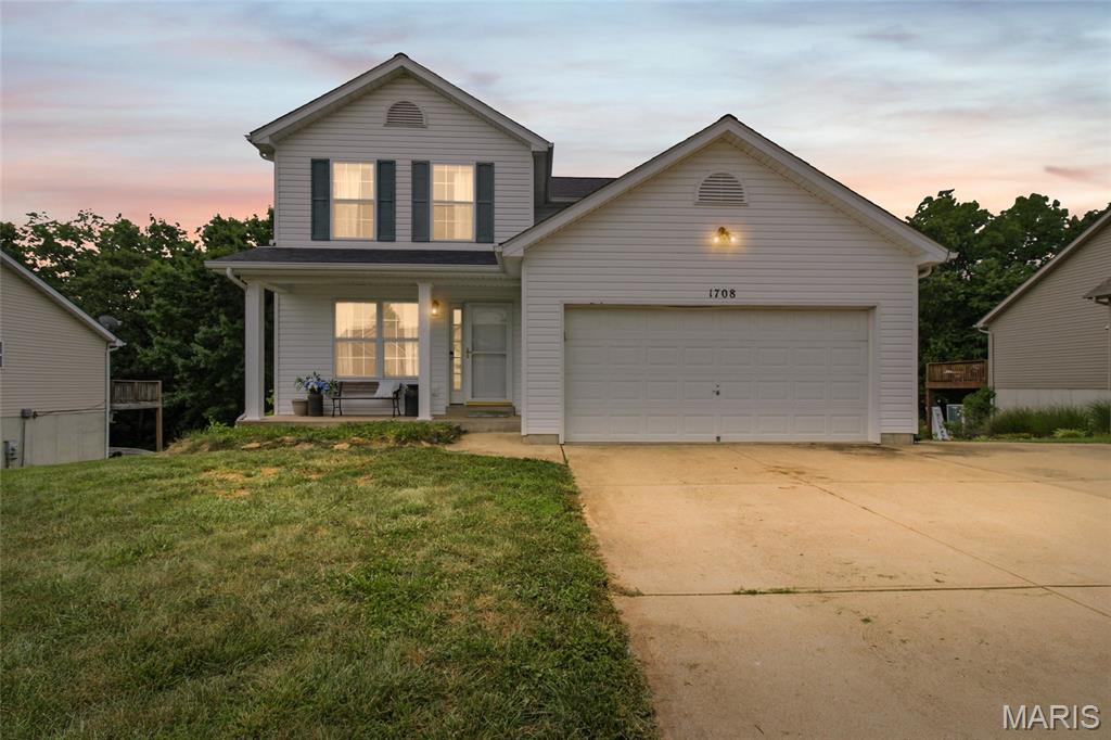 3 Bedroom 2.5 Bathroom in Brickyard Subdivision in Hillsboro School District. This two story home, on a part of the street with a dead end,  features an extra wide concrete pour on the side of the house for extra parking, an inviting front porch, a kitchen with plenty of cabinets, a pantry that could be converted back to a main floor laundry, a half bath on the main level for guests, the walkout basement with a rough-in for a bathroom, the garage is heated, and the back yard, which has a vinyl fence going around it, is private and backs to trees. The roof was replaced in 2025.  Make your appointment today!