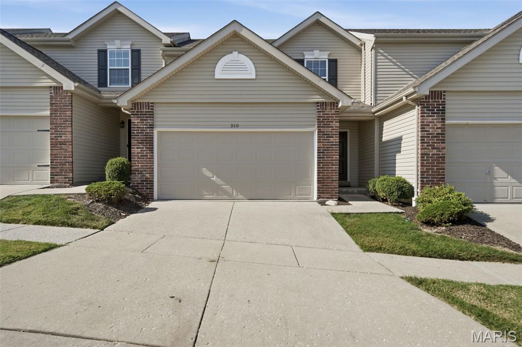 Welcome home to this beautifully updated 2-bedroom, 2.5-bath two-story townhouse! Designed with convenience and comfortable living in mind, this move-in ready home features fresh paint, new flooring, and a stylish kitchen complete with granite countertops. The spacious layout includes a convenient second-floor laundry room, an attached two-car garage, and a full basement offering additional storage or future living possibilities, including rough-in plumbing for a bathroom. Step outside to enjoy the newly added rear patio, creating a great space for relaxing or entertaining. Well maintained and thoughtfully updated, this home offers the ideal combination of modern finishes, functional space, and low-maintenance living. Just move in, make yourself comfortable, and enjoy!