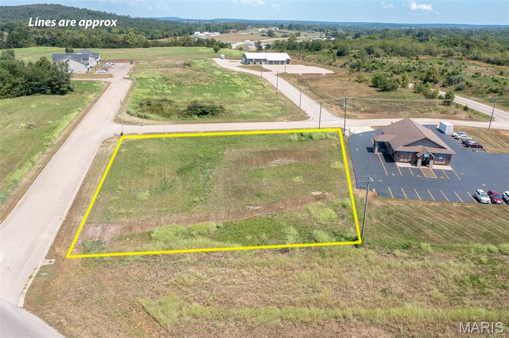 Great opportunity on this 1 acre commercial property! This tract is located near Hwy 67 and is highly visible and easily accesable from Hwy 72 and the Hwy 72 Bypass. Electric and sewer are on site with water available. Road frontage on two sides adds value and allows for many possible uses. Multiple tracts are available, providing an opportunity for just about any development vision.