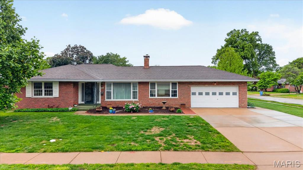 Beautiful brick ranch in one of Florissant's most sought-after neighborhoods - Over 1700 sq ft of main floor living. Updated kitchen, beautiful wood soft close cabinets * Family room features wood burning fireplace * Living room/Dining room have beautiful wood floors * large primary bedroom with double closes * Primary bath features walk in shower, and large vanity - also has a large closet * other 2 bedrooms are very nice size too with wood floors. Lots of closet space throughout. All newer windows. Partial basement finish with family room/bar and half bath featuring luxury vinyl flooring, workshop area, large laundry area & double cedar closet!  Lovely back yard with partial privacy fence, Gazebo &  Beautiful Amish shed stays!  Newer electric & HVAC systems * Large 2 car garage with lots of outlets and additional storage *  All upgrades top quality *  This home is meticulously clean and so very well cared for! Hurry & make this beautiful house your home!
