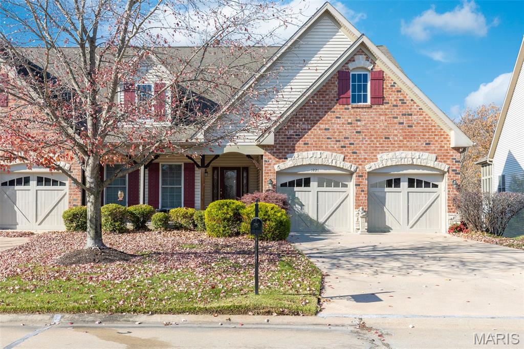 Exclusive Enclave of Luxury Villas in a residential neighborhood.  Conveniently located off Prospect Rd., just minutes to Hwy 64/40,  this charming Villa offers a wooded view from it's over-sized windows in the great room & primary suite for the ultimate in privacy.   3+ bedrooms, 2.5 baths with a palatial MAIN FLOOR primary suite with elegant primary bath w/ curb-less, oversized shower.  Recently updated kitchen w/ new quartz counter tops, upgraded 42" cabinets and breakfast bar for casual dining PLUS walk-in pantry.  Spacious den with built-in bookshelves, formal dining room with tray ceiling, expansive great room with a wall of windows overlooking the woods, brick accent wall and gas fireplace flanked by built-in bookshelves.  Main floor laundry room, large, screened-in porch ideal for al fresco dining or lazy fall days over looks woods.  Spacious lower level with family room, 2 additional bedrooms, full bath, gas fireplace, additional deck plus ample, unfinished space for storage.  Attached, 2 car garage.