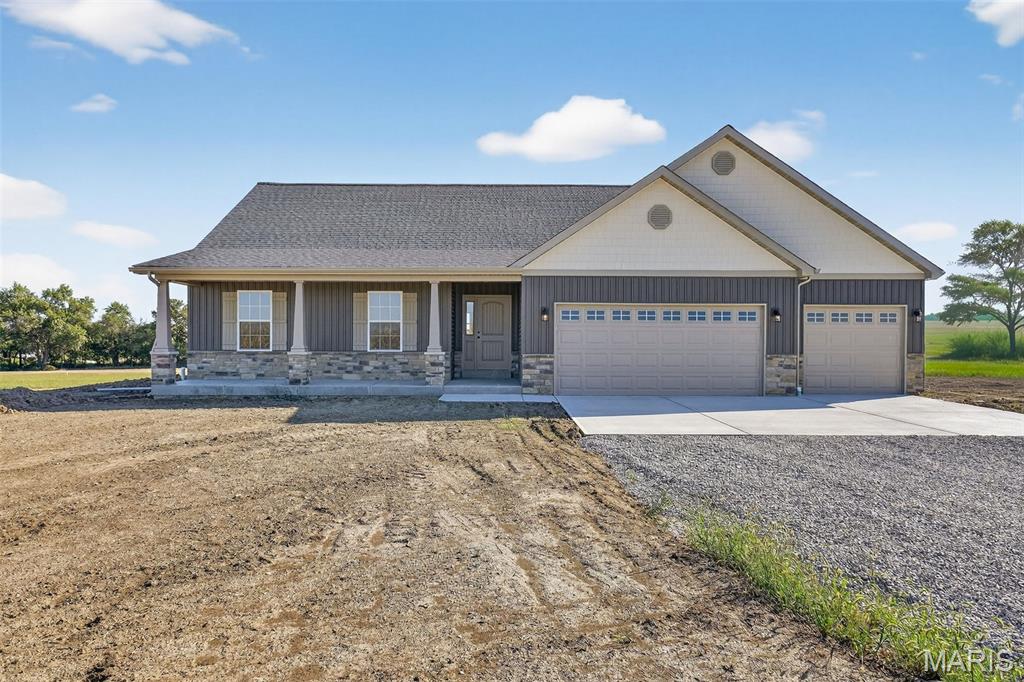 Move in Ready! Sitting on 2.5 flat acres just 10 Minutes from Troy & 20 Minutes from Wentzville. This Quiet County Living is a Community with just 4 Lots! The "Breckenridge" Model is 1654 sqft 3 Bedroom/ 2 Bath Open Concept Floor plan. Enter the Front door into Foyer leading to the Great Room W/ Vaulted Ceilings, Oversized Open Kitchen W/Large Eat-in Butterfly Island, 42 Inch White Shaker cabinets W/ Granite Counter Tops. In the Kitchen you will find Stainless Steel Appliances, full Pantry and Recessed Lighting. Laundry Room is conveniently located on the Main Floor. The Master on-suite with Walk-in Closet, Ceiling Fan, Double sink Vanity, Soaker Tub & Step-in shower in Master Bath. Other Interior Upgrades include 2 Panel Doors, Tilt in Windows, Oil Rubbed Bronze Door Hardware, Light Fixtures & Plumbing Fixtures. Iron Spindle Banister Leading to the Full Basement W/ an egress, & full roughed in Bath for Future Finish. The Craftsman Style Exterior includes Sill High Stone W/ 2 Columns, Shake Siding in the Gables, & an Oversized 3 car Garage. Schedule your private showing today!