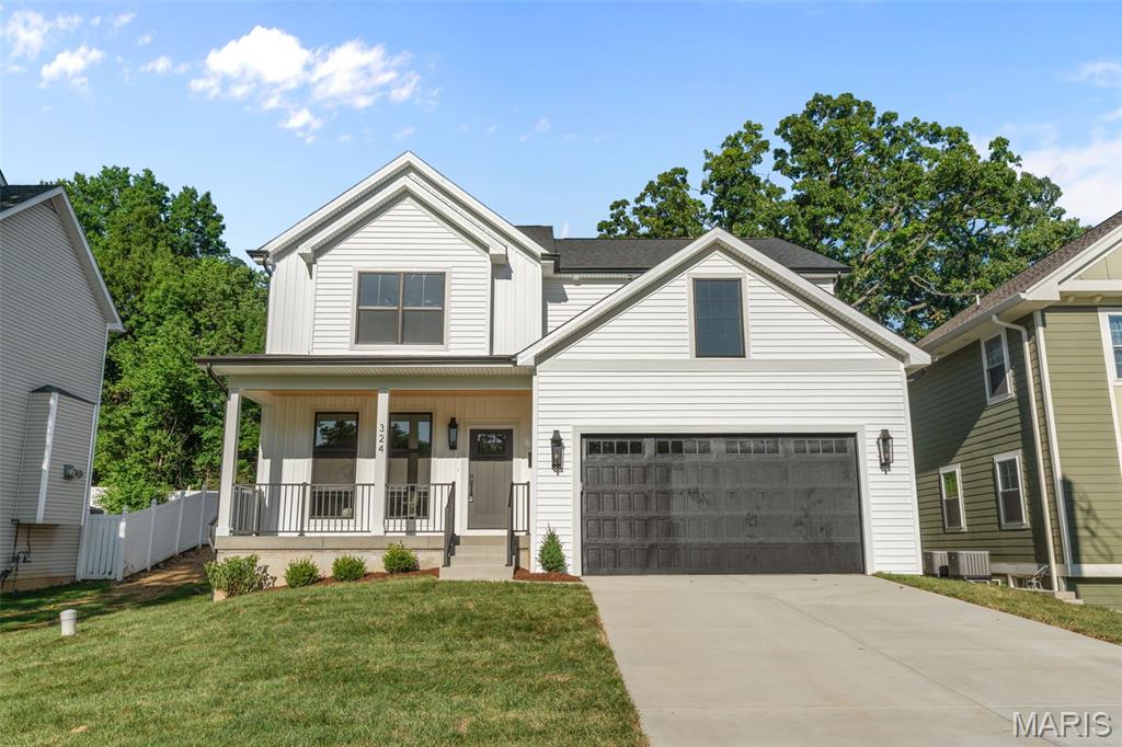 Welcome to this stunning new construction home on a private cul-de-sac just steps from Kirkwood Park! Full of luxurious custom details and quality craftsmanship, this is the home you've always dreamed of! The front elevation creates outstanding curb appeal with board and batten detail, craftsman style front porch with wood ceiling, and high-efficiency fiberglass black windows. The foyer opens to the charming office with wainscoting, stylish lighting, and European white oak flooring that continues throughout the main level and into the upstairs hall and primary bedroom. The open layout of the main living space is perfect for hosting gatherings. In the great room, you'll have a gas fireplace with shaker trim and hand-laid tile surround. The dining room features a beautiful chandelier and 12' panel Vista glass door to the back patio. It flows seamlessly into the showstopper kitchen, boasting quartz counters, premium cabinetry, a dining feature island, stainless appliances, commercial gas range, and a beverage refrigerator, plus a walk-in pantry. A half bath completes the main level. Upstairs, the primary suite is a retreat with a tray ceiling, closet with organization system, and a spa-like bathroom with dual-sink vanity, freestanding tub, and a step-in tile-surround shower. You'll have three more spacious bedrooms upstairs, with premium carpeting and ceiling fans, plus another full bath with double-sink quartz vanity, tiled flooring, and tile-surround tub, as well as a convenient laundry room. The finished basement adds a large family room, 5th bedroom, and bathroom with beautiful tilework and matte black fixtures. Enjoy the summer on the patio overlooking the backyard, shaded by trees. Amazing location just moments from Downtown Kirkwood's shopping and restaurants, Kirkwood Schools, and quick access to I-270 and I-44. Don't miss out on this wonderful opportunity!