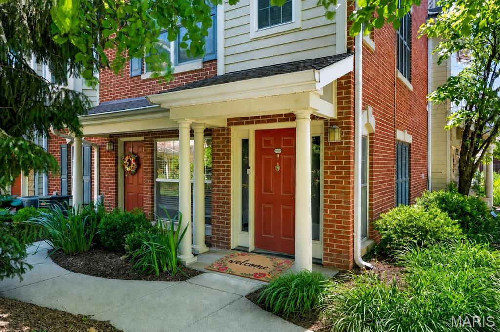 Refined, sophisticated, and impeccably maintained townhome-style condo perfectly situated in McKnight Crossing just steps away from Tilles Park! This chic and inviting 2 bed, 2.5 bath home offers 1,361 sq ft of thoughtfully designed living space. Rich bamboo floors, marble tile, crown molding, graceful arched doorways, stylish designer lighting, six-panel doors, and upscale finishes create a warm yet sophisticated ambiance throughout. The sun-filled open floorplan showcases a spacious living room and dining area that seamlessly connects to the stunning gourmet kitchen featuring granite countertops, 42” maple cabinetry, stainless steel appliances, breakfast bar, planning desk, powder room, and laundry room.  Upstairs, retreat to the tranquil primary suite complete with a charming bay window, walk-in closet, and beautifully appointed bath, along with an additional spacious bedroom and full bath.  Andersen energy-efficient windows, newer roof and one garage space included. Residents enjoy resort-style amenities including a sparkling pool, BBQ area, picnic tables, gardens, and dog park. Just moments from dining, coffee shops, fitness studios, and shopping located in the desirable Webster Groves School District.  This move-in ready gem offers exceptional comfort, convenience, and lifestyle!  Special Financing Incentives available on this property from SIRVA Mortgage.
