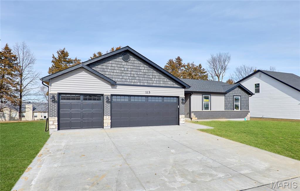 BRAND NEW home with every option you could imagine! They include vaulted ceilings, rounded “bullnose” corners, granite or quartz countertops, stainless steel appliances, 42" cabinets with "cushion close", custom neutral-colored paint job throughout, LVT flooring throughout most of the home, framed windows, taller baseboards, adult-sized cabinets in bathrooms with marble countertops, walk-in closets, upgraded carriage garage doors with openers on 3 CAR Garage, full bath rough-in, panel doors (many varieties), and upgraded water/light fixtures throughout the house! MAIN FLOOR laundry! Fully sodded yard (front/sides/back). *Pictures are of previously built homes. Builder/Broker* This home is USDA eligible.