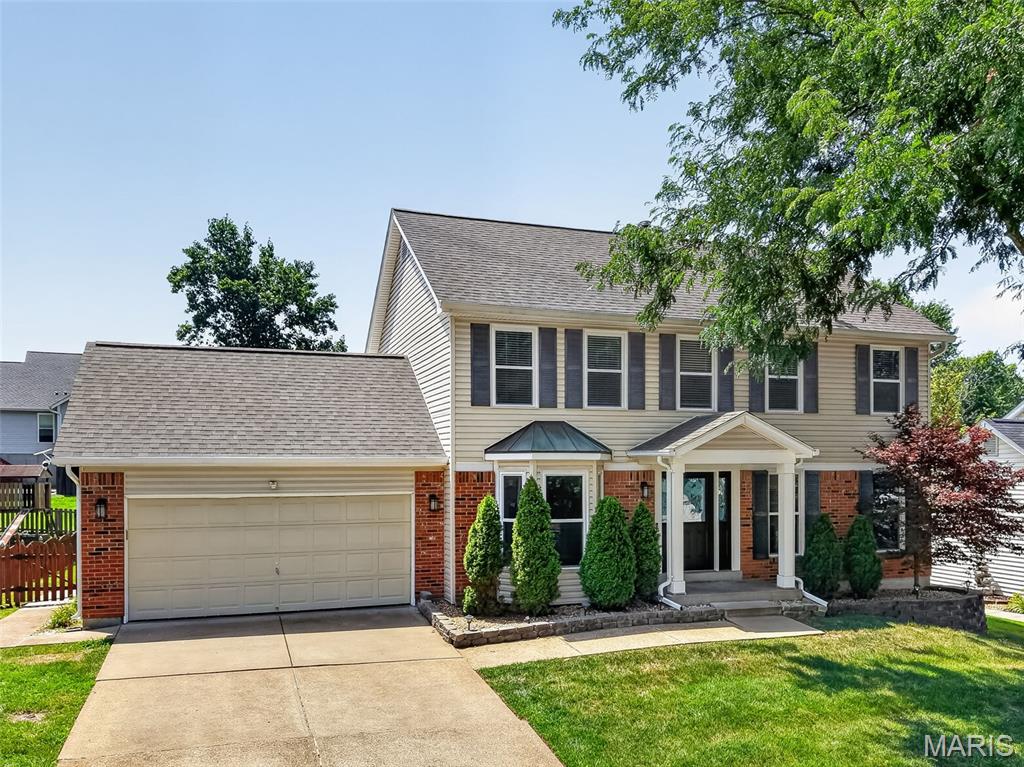 Better than new and loaded with over $120,000 in recent upgrades, this exceptional home is tucked away on a peaceful cul-de-sac in the highly sought-after Rockwood School District. From the moment you arrive, the charming covered front porch, premium brick elevation, and distinctive landscaping create unforgettable curb appeal. Step inside to discover a home that has been thoughtfully transformed with fresh Sherwin-Williams designer paint, stunning 6MM Mohawk waterproof luxury vinyl plank flooring, plush new carpeting, updated lighting, ceiling fans, baseboards, blinds, hardware, and more. Sunlight pours through the brand-new windows, creating bright, inviting spaces designed for everyday living and effortless entertaining. The beautifully updated gourmet kitchen is the heart of the home, featuring granite countertops, stainless steel appliances, soft-close cabinetry, a center island, pantry, coffee bar, and peninsula with additional seating—perfect for everything from morning coffee to holiday gatherings. The adjoining family room offers a warm and welcoming atmosphere with a bay window, classic brick wood-burning fireplace, and surround sound wiring, while the formal dining room with its elegant bay window provides the ideal setting for hosting family and friends. Escape to the spacious primary suite complete with a walk-in closet and beautifully updated spa-inspired bath featuring a soaking tub, oversized shower, dual vanity, and modern finishes. Additional bedrooms are generously sized, and the refreshed hall bath has been tastefully updated with a new vanity, mirror, and fixtures. The outdoor living spaces are truly spectacular. Enjoy evenings on the oversized wraparound concrete patio or spend summer days in the newly constructed 27’ x 54’ above-ground pool with deck. The large fenced backyard also features a basketball hoop, mature trees recently cleared for added openness, and plenty of room to play, entertain, or simply unwind. Additional highlights include a new HVAC system, architectural shingle roof with gutter guards, smart thermostat, attic fan, an impressive lower-level workshop with custom built-ins, and countless mechanical and cosmetic improvements that provide true peace of mind. As an added bonus, residents enjoy outstanding neighborhood amenities including subdivision pools, clubhouse, tennis courts, pickleball courts, fitness center, and easy access to shopping, dining, top-rated schools, and Highways 141, 44, and 30. This is the rare opportunity to own a truly turnkey home where every detail has already been thoughtfully completed—simply move in and start making memories.