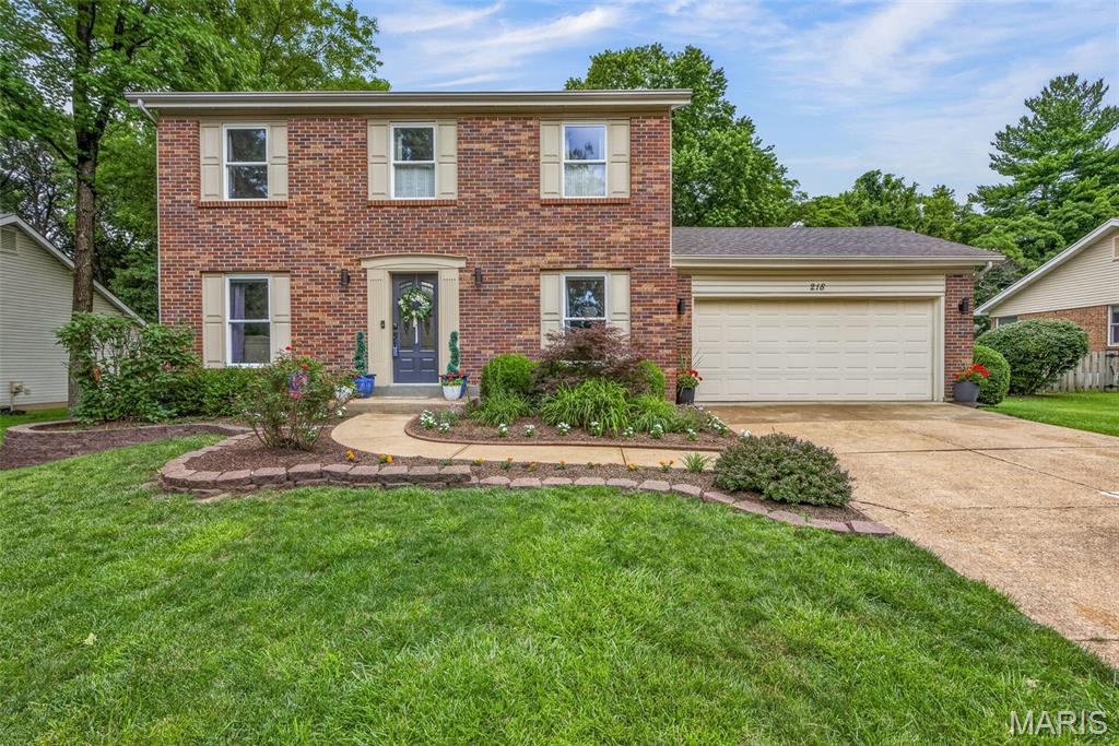 Great location in the heart of Ellisville! Located off sought after Reinke Road nestled in Pinewood Subdivision. This could be the one! Gorgeous 2 Story 2,255 Sq Ft. 4 Bed 2.5 Bath Brick Home with 2 car garage. Welcome in to the open foyer with beaming hardwood floors and spindle staircase. Formal dining room and living room. Great room with fireplace and bay window open to the kitchen. The kitchen features updated cabinets plenty of counter space and tile backsplash. Upstairs includes all 4 bedrooms. The primary suite features an updated bathroom with shower and newer vanity. Great floor plan with lots of space! Enjoy and entertain in the finished basement rec family room, perfect for game area, theater or workout space! The back yard is great for relaxing & playing! Back yard with large deck and turf space for all kinds of activities! Short walk to Owl Hollow Park. Close to Ballwin rec plex, shopping, restaurants, schools, & Bluebird Park! This home will not last long! OPEN HOUSE SUNDAY 1-3!