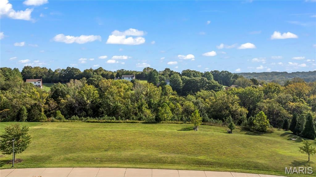Set behind the gates of one of West County’s most exclusive enclaves, this exceptional offering within Wardenburg Farms presents a rare opportunity to secure three acres of pristine, build ready ground in a setting defined by privacy, scale, and architectural significance. Wardenburg Farms is a private, gated community comprised of estate caliber homes on expansive acreage parcels, where design, craftsmanship, and discretion converge. Properties within the enclave consistently command multi million dollar valuations, reinforcing its position as one of the premier residential streets in the greater Chesterfield and Wildwood markets. Positioned just minutes from Chesterfield Valley, one of the region’s fastest growing commercial and lifestyle corridors, this location offers a rare balance of seclusion and accessibility. Continued growth, infrastructure investment, and retail expansion throughout the Valley and surrounding West County submarkets have driven sustained demand for luxury housing, further elevating the long term value of buildable land in communities like this. The homesite itself is a blank canvas of uncommon quality. A level, build ready parcel with walkout potential, surrounded by mature natural landscape and generous frontage, allowing for the creation of a truly bespoke estate, whether a modern architectural statement, timeless country manor, or fully customized luxury compound. This is not simply land. It is an opportunity to design without compromise in a location where the standard has already been set at the highest level.