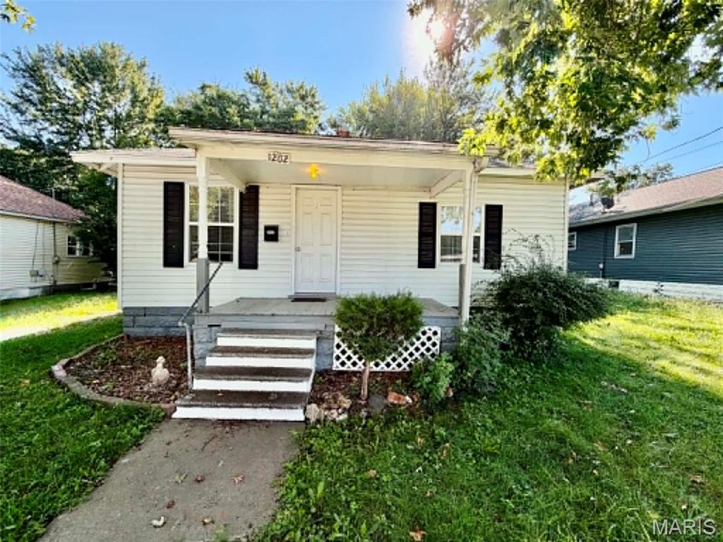 This cozy 2 bedroom, 1 bath home has great potential!  Bring your personal cosmetic touches to make it your own!  Featuring a covered front porch for relaxing and a backyard with 2 storage sheds that provide plenty of room for outdoor enjoyment and extra storage.  Whether you're searching for your next investment property or a place to call home, this one offers a great opportunity.  Schedule your appointment today!
