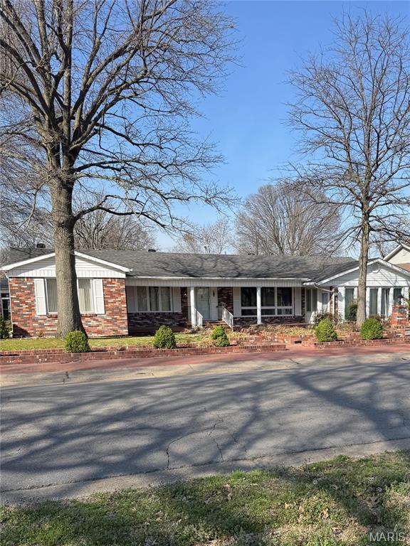 Over 8000 sq. ft. home featuring 5 bedrooms, 2 full baths and 3 half baths. Large kitchen with lots of storage.  Beautiful masonry fireplace.   Large dining family room, glassed in sunroom, many extras.   Formerly a home and catering business.  All equipment needed for a catering business is available.