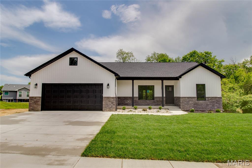 STUNNING! 4-bedroom, 3-bathroom new construction home sits on a half-wooded lot and offers great backyard privacy! Featuring a welcoming covered front porch, covered back patio, and an elevated composite deck.
Inside, you’ll find an open layout with vaulted ceilings, lots of natural light, and durable Luxury vinyl plank flooring throughout. The kitchen features a large center island with a breakfast bar, quartz countertops, and flows right into the living area with an electric fireplace—perfect for everyday living or entertaining.
The fully finished walk-out basement includes a kitchenette and plenty of natural light, giving you extra space for guests or a second living area.
All appliances including the washer, dryer, and kitchenette refrigerator are included, this builder didn't cut any corners! This home is truly move-in ready and offers a great mix of comfort, style, and privacy.