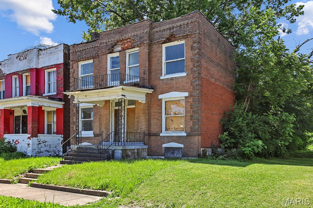 Unlock the potential of this two-story duplex in the historic Lewis Place neighborhood of St. Louis City. Priced at $29,900, this property is ideal for investors or renovators seeking a project. The home offers classic architecture and plenty of space to create two desirable rental units or a stunning owner-occupied residence. Located just minutes from the Central West End, you’ll enjoy easy access to world-class hospitals, including Barnes-Jewish and St. Louis Children’s Hospital, as well as nearby parks and green spaces for recreation. This location combines historic charm with convenience to major amenities. The property is being sold AS-IS, and the seller will make no repairs or provide any inspections prior to closing. All inspections are for the buyer’s informational purposes only. Act quickly for this incredible opportunity to restore a St. Louis classic. Seller is a licensed real estate agent.