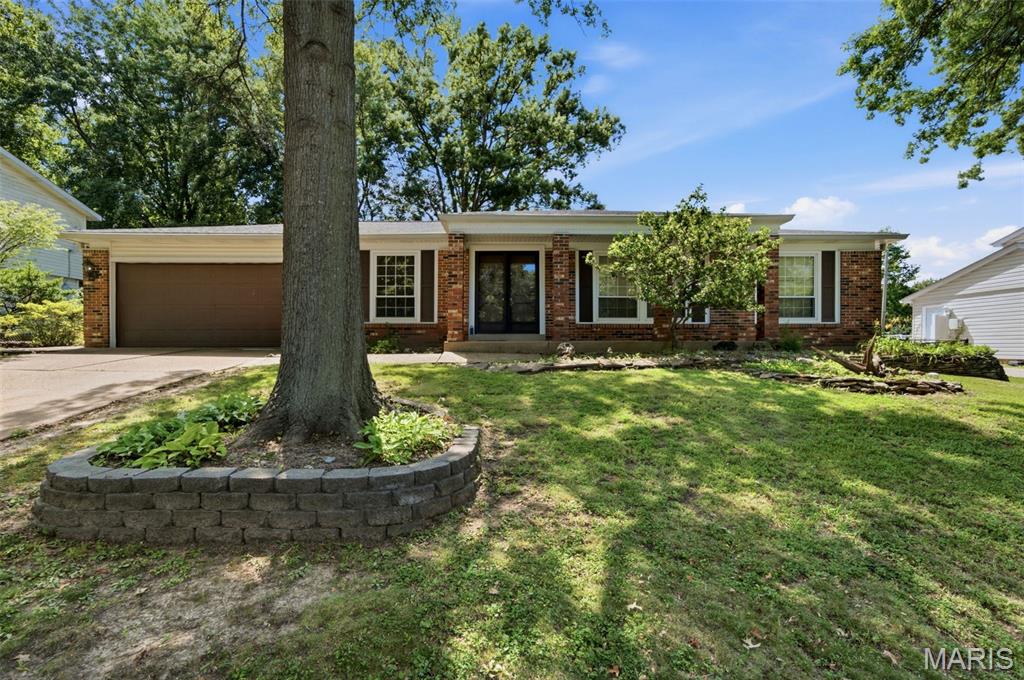 From the double door entry to the end of your tour, you’ll find a lot to love. The 4-sided brick ranch gives you a lot to check off your list. Large living room and  dining room. Continue in to the warm and cozy family room with sliding door, to the back patio and spacious yard. Family room has a  wood burning fireplace. Kitchen with enough room for a kitchen table, generous cabinet space with a pantry that could be customized. Primary bedroom with private bathroom and a peaceful back yard retreat from the primary bedroom sliding doors The view has beautiful mature trees and fenced in yard for your pets. Unfinished basement runs the length of the house so can made in to a great living area and has tons of storage. Built in 1971 and lived in by one family.  Great neighborhood and close to shopping and restaurants. The house is being sold AS IS and doing no repairs or occupancy inspection. This would be a great investor opportunity to do some updates.  The family hopes someone moves in and loves the house as much as they did.
