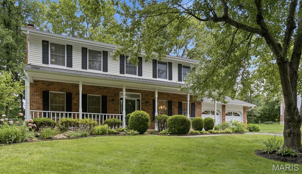 Welcome to 301 Claymont Cove Court, a beautifully maintained brick two-story home nestled on a quiet cul-de-sac in the sought-after Claymont Cove subdivision. Lovingly cared for over the years, this home offers the perfect blend of timeless character, thoughtful updates, and comfortable living spaces designed to bring people together. With 4 bedrooms, 2.5 bathrooms, and a location within the highly acclaimed Parkway School District, this is the kind of home where lasting memories are made.

From the moment you arrive, the charming covered front porch invites you to slow down and stay awhile. Whether you're enjoying your morning coffee, greeting neighbors, or unwinding at the end of the day, this welcoming space sets the tone for everything that awaits inside. Step through the front door and you'll immediately appreciate the warmth and pride of ownership that can be felt throughout the home.

The main level offers a traditional yet highly functional floor plan with spaces for both everyday living and special occasions. A formal dining room provides the perfect backdrop for holiday gatherings and family celebrations, while the dedicated office or living room offers flexibility for working from home, a playroom, or a quiet retreat. At the heart of the home, the spacious family room features a cozy gas fireplace flanked by custom built-ins, creating an inviting place to gather with family and friends throughout the seasons.

The kitchen has been thoughtfully updated with recently painted cabinetry and beautiful granite countertops, blending modern style with everyday practicality. Whether you're preparing weeknight dinners, hosting game day gatherings, or helping with homework around the kitchen table, this space is designed to support life's daily moments.

Upstairs, hardwood flooring extends throughout all four bedrooms, adding warmth, durability, and timeless appeal. The spacious primary suite serves as a peaceful retreat, complete with a sitting area that's perfect for curling up with a good book, enjoying a quiet morning, or simply escaping the demands of the day. The suite also features a walk-in closet, dual vanities, and a private bath designed for comfort and convenience. Three additional bedrooms provide plenty of space for family members, guests, hobbies, or a growing household.

The unfinished lower level offers a blank canvas with endless potential. Whether you envision a future recreation room, home gym, media space, or simply appreciate the abundance of storage, this level provides flexibility to make the home your own for years to come.

Outside, mature trees and established landscaping create a picturesque setting that enhances the home's curb appeal and sense of privacy. The backyard patio offers the perfect spot for summer barbecues, outdoor dining, or simply enjoying a peaceful evening under the trees.

Located in one of Ballwin's most desirable areas, you'll enjoy convenient access to parks, shopping, restaurants, and major commuter routes, all while being tucked away in a quiet neighborhood setting. Move-in ready and exceptionally cared for, 301 Claymont Cove Court is more than just a house—it's a place to put down roots, create traditions, and truly feel at home.
