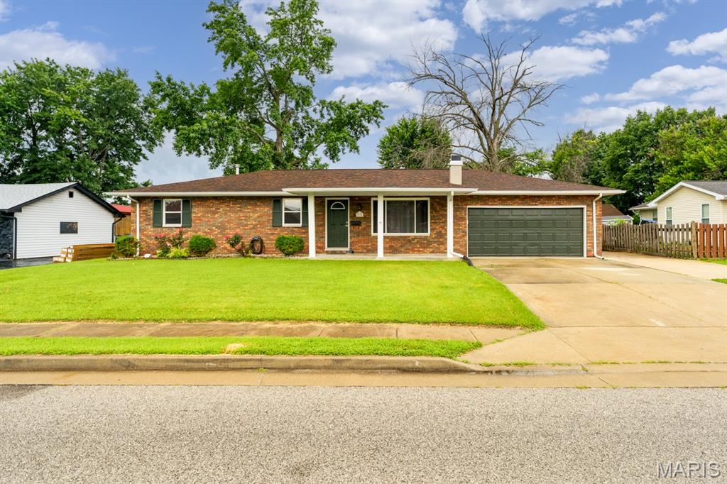 This home provides ample living space with three well-proportioned bedrooms, offering flexibility for family, guests, or dedicated home office areas. The 3, bedrooms, two bathrooms are conveniently located to serve both residents and visitors with. Home has gone through some renovations, primary area of home, has some new windows, new kitchen sliding doors, some led lights throughout the home. new flooring, and freshly painted. Kitchen also has new flooring, lots of kitchen cabinets /dining room combo with a breakfast bar, beautiful new sliding glass doors that look out to a 216 square ft. covered back patio. Bathroom have been updated, with new vanity, light fixtures, shower surround with ceramics accents, new toilet installed for your comfort. Yard has a wood privacy fence and a very spacious yard. Home has a large, finished basement with a lovely family room with a recreation room attached. Lower level also entertains a large 10x16 Bonus room, great for office space, man cave or gaming room etc, wood privacy fence in.  Spacious 2 car attached garage, leaves you with storage and place to park out of the weather. To experience the potential of this residence firsthand, schedule a private showing today. Home comes with a home warranty