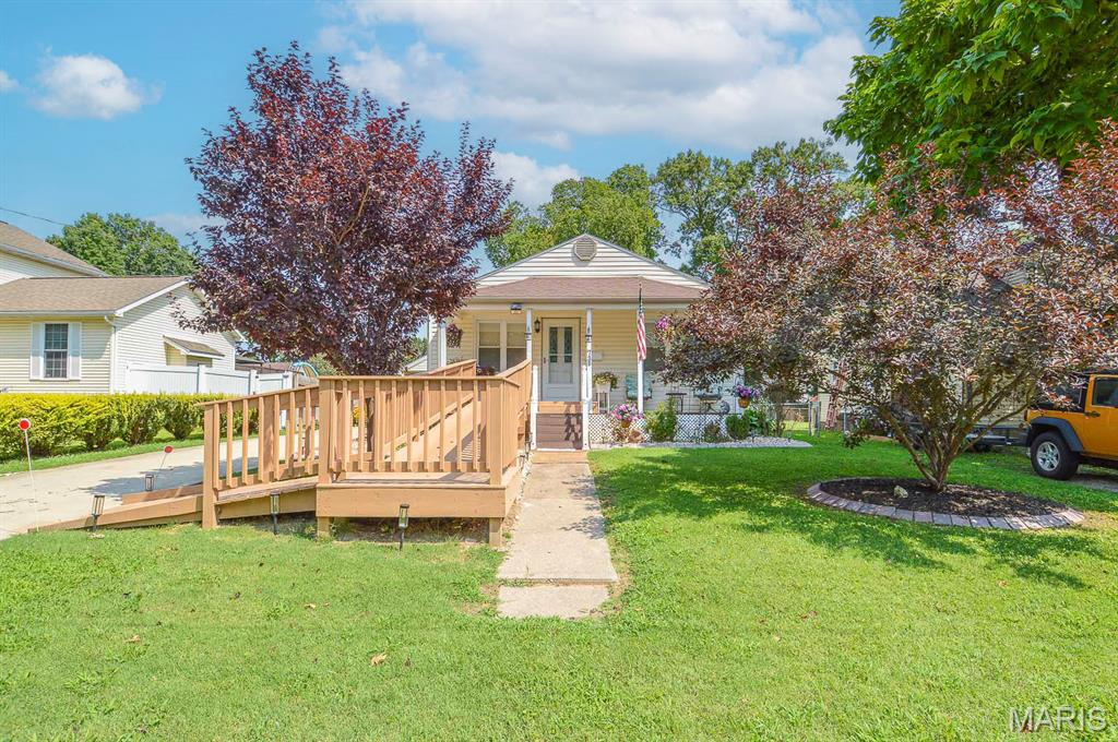 Price listed is Starting Bid Only. Bidding starts closing 9/03/2026 @ 5 p.m.  Lovingly cared for 2BR/1BA estate home offering comfortable living spaces, a full basement, detached garage, carport, and a fully fenced backyard in the heart of Collinsville, IL! Step inside to a spacious living room filled with natural light from large vinyl windows and featuring convenient access to the primary bedroom with ample closet space. The eat-in kitchen is well-equipped with stainless steel appliances, abundant counter top space, and plenty of room for casual dining. A well-appointed full bathroom is conveniently situated near the second bedroom and the laundry room. The full, unfinished basement provides exceptional storage space and offers the opportunity to finish for additional living space that best suits your needs. Outdoors, enjoy your morning coffee from the inviting covered front porch or relax beneath the covered rear patio overlooking the large, fully fenced backyard, perfect for pets, gardening, entertaining, or outdoor activities. Conveniently located near shopping, dining, parks, and major roadways, this well-maintained home is ready for its next owner to enjoy. Property will sell under auction terms and be sold AS- IS, WHERE-IS. Seller, will not make any repairs as a result of any building, occupancy, or environmental inspections. Buyer will be required to sign an Auction Purchase & Sale Agreement if final bid is accepted by Sellers.