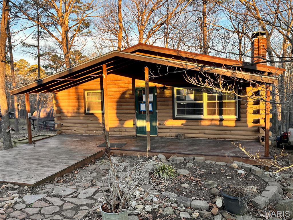 Multiple Offers; Submit High/Best contract no later than 10am CDT, Monday 3/30. Private Grayhawk lake community log cabin with 2 bedroom, 2 full bath and walk-out basement.  Features wood burning fireplace, vaulted ceilings and circle drive.  This property is eligible under the Freddie Mac First Look Initiative through 03/29/2026. Seller will not complete any repairs to the subject property, either lender or buyer requested. The property is sold in AS IS condition. Pre-Approval letter or Proof of Funds required. Sale addendum and earnest money as certified funds will be required for final acceptance. Seller is open to concessions during negotiations. Concessions cannot exceed actual closing costs.