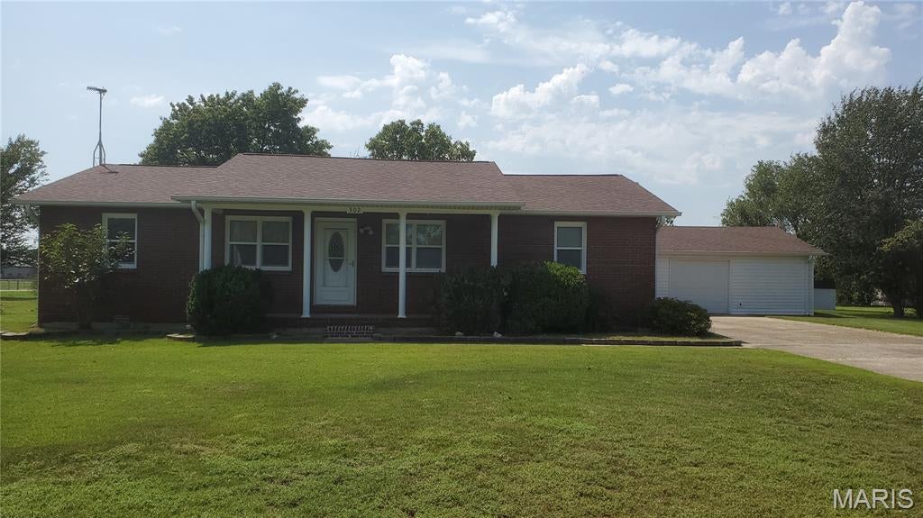 Clean MOVE-IN-READY home sitting on a corner lot in a RURAL subdivision. This All-BRICK home offers plenty of space for outdoor activities and plenty of room for your things within the storage shed and oversized 2 car garage. The windows have been upgraded and most of the floor coverings have been replaced. Lots & Lots of fresh paint along with upgraded interior doors. The kitchen appliances have been replaced and they ALL STAY. The large Sunroom makes for the perfect place to relax or offers that extra space needed for those family gatherings during the Holidays.
