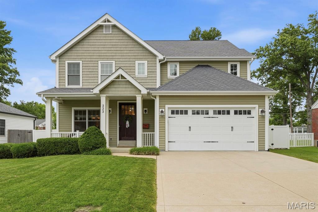 Welcome to this beautifully appointed 14 year young home, perfectly situated in one of the area's most sought-after neighborhoods. Designed for everyday living as well as entertaining, this spacious home blends luxury, comfort and today's most wanted amenities. The heart of the home is the gourmet kitchen with 2 full size refrigerator/freezers and an impressive island that overlooks the breakfast room and family room with fireplace and built ins. The main level also includes a formal dining room for special gatherings, powder room and a mud room conveniently located off the 2 garage to keep your life organized. Upstairs you'll find 3 generously sized bedrooms, a hall bath with double sinks, laundry room and an exceptional primary suite, with exquisite millwork, 2 walk in closets and a generous sized bathroom. The finished lower level expands the living space offering a 5th bedroom, 3rd full bath, spacious rec room and an impressive golf simulator room. Outside you'll discover a backyard designed for relaxation, play and entertaining. Two stylish louvered pergolas create outdoor living spaces for dining al fresco, hosting friends and family or simply enjoying a quiet evening. A hot tub completes the outdoor oasis offering the ultimate place to relax. With this desirable location, floor plan and indoor and outdoor amenities this home offers a rare opportunity to enjoy luxury living. Showings to start Saturday 6/27.