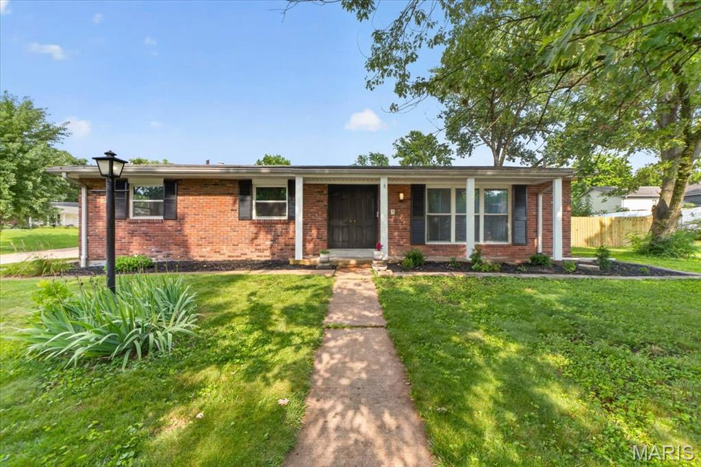 Fall in love with this gorgeous, fully renovated 3 Bed / 3 Bath ranch in St. Louis! Boasting incredible curb appeal with a flower-filled front porch, this home opens up to a bright, vaulted open-concept space. Absolutely everything has been done for you: a brand-new kitchen, stunning new countertops, new flooring throughout, completely renovated bathrooms, brand-new doors. Features a fully fenced backyard with a patio and a massive partially finished lower level with a built-in bar that is ready to make your own. Bonus peace of mind: the basement also features a partial plumbing stack replacement, taking care of the heavy lifting for you!