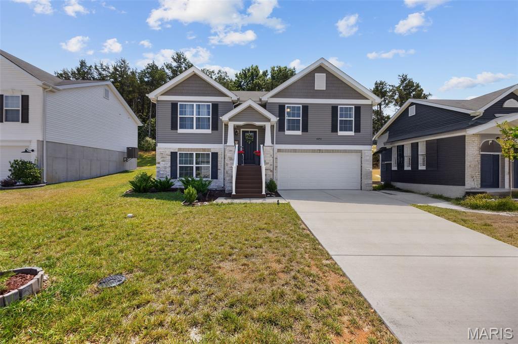 Fall in love with this delightful family home that checks every box. With tons of square feet of comfortable living space, this home has room for the whole family to spread out. Every room has been designed with both functionality and aesthetics in mind. This newer build means less maintenance and more time enjoying your home. The pride of ownership is evident throughout. You will love this stunning like new split-level home, newer community, like new home, three bedrooms, two bathrooms, partially finished basement, rough in bathroom ready to go, spacious lot, Northwest schools, luxury vinyl flooring, less than three years old, this spacious kitchen in the chefs dream with plenty of counter space, larger bedrooms  which also include a primary and ensuite, closet space galore,  and close to shopping and dining, creating a living experience that is both comfortable and refined. Imagine weekend barbecues in the backyard, cozy movie nights in the living room, and a lifetime of memories waiting to be made. Located in the friendly Obrien neighborhood, you will be surrounded by great schools, shopping, dining, and a true sense of community. This is a compelling opportunity for buyers seeking quality and value. Come see your future home! Schedule a showing today.
