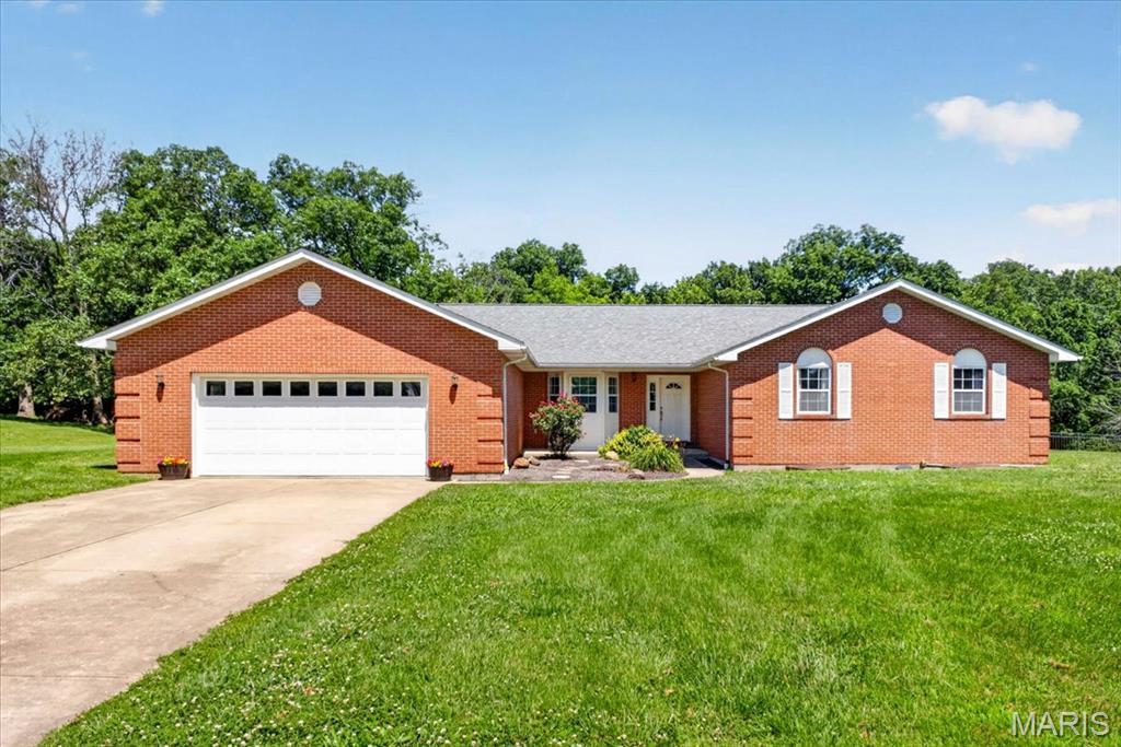 The one you have been waiting for.... FULL Brick, Ranch with 5 bed & 5 bath home on 2.5 acres, 4800+ sq ft living area & Inground SALTWATER Pool + Lower Level Guest Suite! 

The Foyer opens to the fabulous open floor plan with massive 31x23 Living room/dining room with vaulted ceiling, gas fireplace and wet bar is made for entertaining. Next find your way to the main level Kitchen w/loads of oak cabinets, crown molding, center island, stainless appliances that will stay & breakfast nook w/ doors leading to the deck over looking your VERY private backyard!

Primary Suite w/vaulted ceiling, recessed lighting & 2 walk in closets and luxury bath w/walk in shower & jetted tub.  Next door are 2 more large bedrooms and full bath in the hallway.  Main floor laundry w/lots of storage space & door to the outside.

Make your way downstairs to the beautiful family/rec room where you will have plenty of space to watch movies or play games.  And wait until you see the beautiful GUEST SUITE with full Kitchen, full bath, 2 bedrooms, lounge & 2nd laundry hookup.  Two storage areas, one with 1/2 bath and double doors that lead you to the Huge pool w/10.5ft deep end, diving board & slide. Nice retaining wall over patio is great for pool party movie night, just hang a sheet for your projector. 

There is still plenty of space if you desire to build an outbuilding. 

Showings start June 26th, call to make your appointment today!