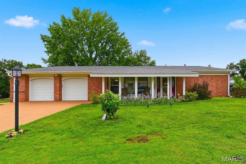 Welcome home to this beautifully maintained 4-bedroom, 2-bath brick ranch in the heart of South County! From the charming covered front porch to the spacious fenced backyard, this home offers comfort, functionality, and room to grow.

Step inside to find a bright and inviting floor plan featuring a large living room, separate dining area, and an expansive family room that opens to the kitchen—perfect for everyday living and entertaining. The kitchen offers abundant cabinetry, generous counter space, stainless steel appliances, and a breakfast bar that keeps everyone connected.

The primary suite includes a private bath, while three additional bedrooms provide flexibility for family, guests, or a home office. Enjoy easy main-floor living with spacious rooms, abundant natural light, and a layout designed for comfort and convenience.

Outside, you'll love the large patio overlooking the fenced backyard—ideal for summer BBQs, pets, play, or simply relaxing at the end of the day.

Conveniently located near shopping, dining, parks, and major highways, this move-in-ready South County home is one you won't want to miss.
