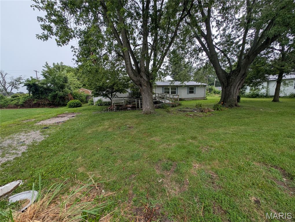 Opportunity awaits in the quiet community of Eagarville, Illinois. The manufactured home features a functional floor plan with a living room, dining room, kitchen with a center island and pantry, three bedrooms, two bathrooms, and a combined utility/laundry mudroom.  Conveniently located with easy access to Illinois Route 138 and nearby Interstate 55, this property offers a country setting while remaining within a short drive of Gillespie, Staunton, Litchfield, and Edwardsville for shopping, dining, schools, and everyday conveniences. Outdoor enthusiasts will appreciate the proximity to local parks, lakes, and recreational opportunities throughout Macoupin County. ALL information is deemed reliable but is not guaranteed and should be verified by the buyer and/or buyers agent before making an offer.
