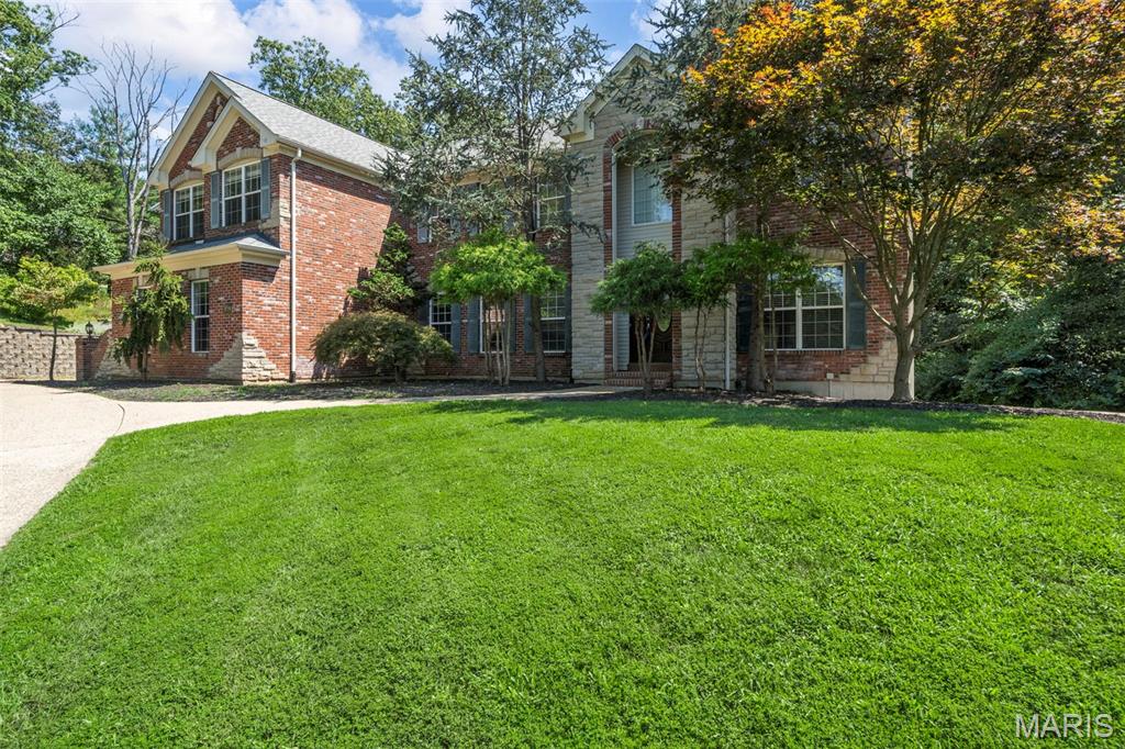 The ULTIMATE Family Retreat awaits sitting on 5.7 ACRES with a 7 CAR GARAGE!! This impressive estate features 6.5'' White Oak hardwood floors, Main Floor Primary, 2nd Floor Primary PLUS In Law Quarters. The sellers have done some incredible updates throughout! Walk in the 2 story entry foyer to the den and formal dining room. Living Room and Hearth room are complete with large format tile and gas fireplaces. Designer kitchen boasts Huge Center Island, new Bosch Appliances, backsplash, stone Counters and adjoins to the hearth room and dining room. Gorgeous Primary retreat has large walk in closets, huge shower w/free standing tub. Upstairs has a loft, additional laundry rm, LARGE Upstairs Primary bdrm suite and 3 additional bedrooms. The w/o lower level has a game room and full bath. Walk out the lower level doors to your private backyard complete with patio pavers and a wood burning fireplace. In Law Quarters is complete w/Large full bath, laundry, full kitchen, bdrm and living space.