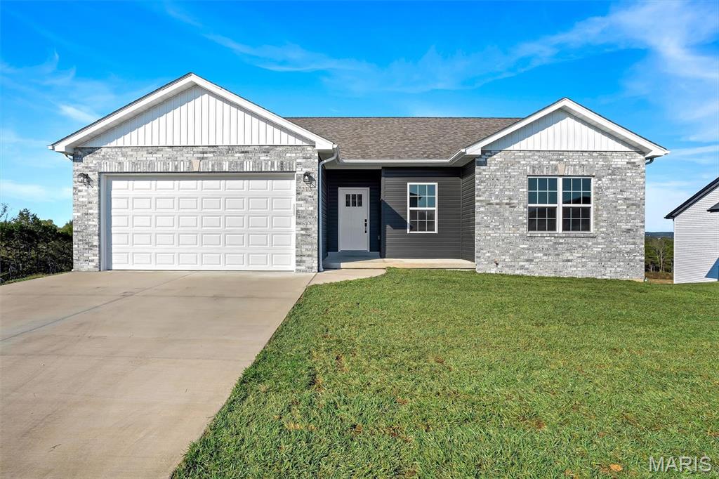 COMING SOON! HOME IN PROGRESS! #UNIONMO. A divided 3x2 ranch plan on a nice corner lot that backs to woods.  This one shows off a grand kitchen with an oversized island, a large composite sink & breakfast bar, loads of white cabinets, awesome granite tops, LVP floors, stainless front microwave & dishwasher, main floor laundry near primary suite & more. Glass slider door in the dining room to a nice 12’x12’ composite deck with white vinyl rail system. Soaring 9' interior house walls throughout. A lovely entry with a large coat closet, door to garage & door to lower level nearby. Primary with a large walk-in closet, oversized double bowl vanity, gorgeous walk-in shower with glass slider door & more. The secondary beds are a nice size & share a full hall bath with a tub/shower & vanity. Very spacious walk-out basement with full bath rough-in & more. The exterior combo of black accents and a light mist color siding, a cozy covered front porch, and a black garage door with glass windows is amazing. ELS HOMES - LOCAL BUILDER AT ITS FINEST - #ELSHOMES