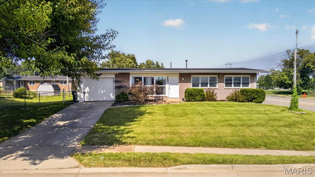 Freshly updated and ready for its next chapter.
This Florissant ranch has been refreshed with brand-new LVP flooring, along with plumbing updates including a sewer stack replacement- giving you real peace of mind on top of the cosmetic refresh.
The Living Room invites you in with large windows and bright natural light, while the Dining Room provides an inviting space for everything from everyday meals to holiday gatherings. Just beyond, the spacious Family Room offers even more room to relax, entertain, or simply spread out. The Kitchen features granite countertops, abundant cabinetry, and a functional layout designed to make daily life easy. The Primary Suite is a comfortable retreat with a beautifully tiled walk-in shower, while 2 additional Bedrooms, a shared Full Bath, and Main Floor Laundry complete the main level.
Downstairs, the partially finished Lower Level adds a spacious Rec Room, a Bonus Room ideal for a home office, workout area, or craft room, plus generous unfinished Storage.
Outside, the fenced Backyard is ready for everything from backyard barbecues and gardening to evenings around the firepit.
With major updates already done, this home offers comfort, functionality, and true move-in-ready convenience. Come see what's new.