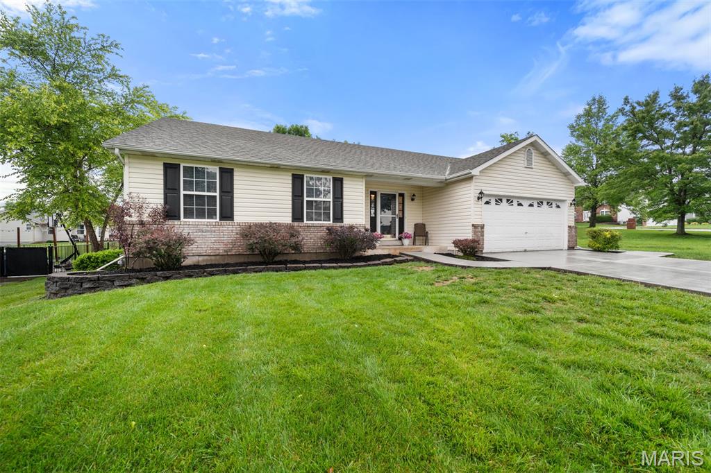 (c.) 1996: Located on a quiet non-through street in the popular Canvas Cove subdivision, welcome home to this updated 3+ bedroom, 3 full bathroom original owner ranch style home (with finished basement) that's ready for its next family! Featuring 1,613 sq ft on the main level, plus a mostly finished basement that nearly doubles the usable space! Enter the formal entryway w/large dbl coat closet to find a great open concept vaulted great room w/gas fireplace! The dining area features a bay bump-out overlooking the rear patio and yard. A spacious kitchen offers a large breakfast bar for more seating, crisp white cabinets, SS appliances & pantry. Convenient main floor laundry room off kitchen/garage access. Down the hall find a gorgeously updated full bathroom that services the 2 spare bedrooms (each w/large closets), and then a spacious primary suite with large full bathroom (tub + sep shower) and walk-in closet. New engineered hardwood floors throughout the home in 2018 (also when the kitchen refresh, hallway full bathroom gut renovation, new lighting fixtures, custom window treatments, fresh painting and more happened). Then, head down to the large finished lower level (remodeled in 2021 with new LVP flooring, tall baseboards, canned lighting and more). Find a large rec room area, space for a home gym, pool table (included!) and another guest sleeping space and full bathroom. Plus, 2 spacious storage areas/utility rooms. Out back you'll enjoy BBQs on your large patio overlooking the level backyard — and bonus, an inground sprinkler system! A BRAND NEW concrete driveway and walkways just installed in spring 2026! A 1 year Choice Home Warranty provided to buyer at closing. Easy access to highways 364, 64/40 and 70, plus close to all the necessary conveniences for groceries, shopping, retail, restaurants and so much more! So don’t wait, this one is sure not to last — schedule your private tour today!