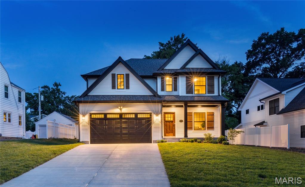 If you've never seen a Pentrex-built home, now is the time. This gorgeous new construction, on the coziest street, and in walking distance to award winning Tillman Elementary is exactly what you've been looking for. The gorgeous mahogany wood door sets the stage for the luxurious but comfortable designer elements you'll find inside. Job-finished hardwood floors stretch throughout the main level. The Kitchen boasts STAINLESS STEEL appliances including a microwave/2nd oven, center island with breakfast bar and additional cabinetry beneath, and a Pantry of chefs' dreams. The area is built for entertaining, open to the Breakfast Room, Family Room, and covered patio that overlooks the backyard. Your Primary Ensuite Bedroom is located on the 2nd Floor and has its own private covered deck that is perfect for early coffee, or midnight cap. Three other bedrooms, each served by a bathroom, and a Laundry Room finish the 2nd Floor. You'll find an additional bedroom, a Rec Area and Bathroom in the Lower Level. very detail, from the  has been very thoughtfully considered to create the perfect atmosphere