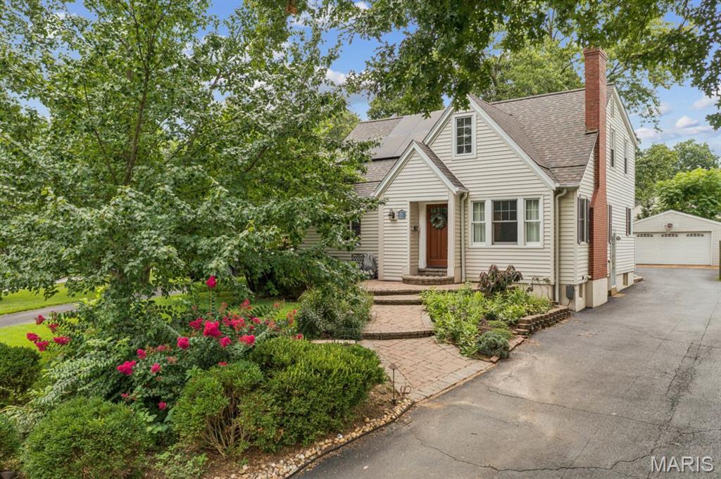 Welcome to 703 Edwin Avenue, where timeless character, thoughtful updates, and the easygoing Glendale lifestyle come together. Set in a friendly, established neighborhood within the award-winning Kirkwood School District, this beautifully maintained 1.5-story home offers the space and flexibility to enjoy every stage of life.

Inside, classic craftsmanship blends seamlessly with a more open, comfortable floor plan. The inviting living room features a gas fireplace with a custom mantel and built-in bookcases, while the separate dining room and SPACIOUS FAMILY ROOM ADDITION provide plenty of room for both everyday living and entertaining. The bright eat-in kitchen is beautifully appointed with white cabinetry, granite countertops, stainless steel appliances, and pendant lighting. A MAIN FLOOR BEDROOM is a coveted feature - for a primary bedroom, visitors, or office. 

Upstairs, you'll find three bedrooms and an updated full bath featuring high-end finishes. The charming 2nd floor east facing alcove with beautiful millwork and built-ins is perfect for playing, crafting or reading. The FINISHED LOWER-LEVEL offers even more space with a recreation room for movie nights, space for an office and sleeping area for guests. 

Outside, enjoy a hardscaped front walk, irrigation system, gutter guards, low-maintenance exterior, and a two-car detached garage. A newer roof, solar panels, and an updated electrical panel were added in 2018, keeping utility bills low.

From neighborhood walks and nearby parks to Glendale’s convenient location, strong sense of community, and easy access to Kirkwood’s shops, restaurants, and schools, 703 Edwin Avenue offers more than a beautiful home—it offers a wonderful way of life.