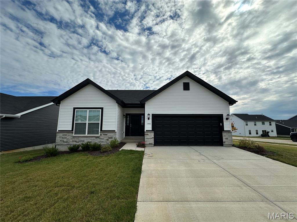 Imagine stepping into this beautiful newly constructed ranch home in excellent Wentzville neighborhood. As you enter, you're greeted by a spacious great room with 9ft. ceilings which makes the room feel larger with a cozy fireplace & soft carpet flooring. This room seamlessly opens up to a modern kitchen featuring elegant dark wood cabinetry, a central island, sleek quartz countertops, a gas stove & stainless appliances.. You will love the vinyl plank flooring that adds a touch of sophistication & just a few steps away is the main floor laundry room. The home includes 3 generously sized bedrooms & 2 full bathrooms. The primary bedroom is a true retreat with a spacious walk in closet. The primary bathroom boasts a tub-shower combo for ultimate relaxation. One of the standout features is the walk-out basement, which opens up to the backyard. Full basement is perfect for storage, home gym or bonus space. This home is ready for rent starting September 18th,2026. No pets. For lease by owner agent.