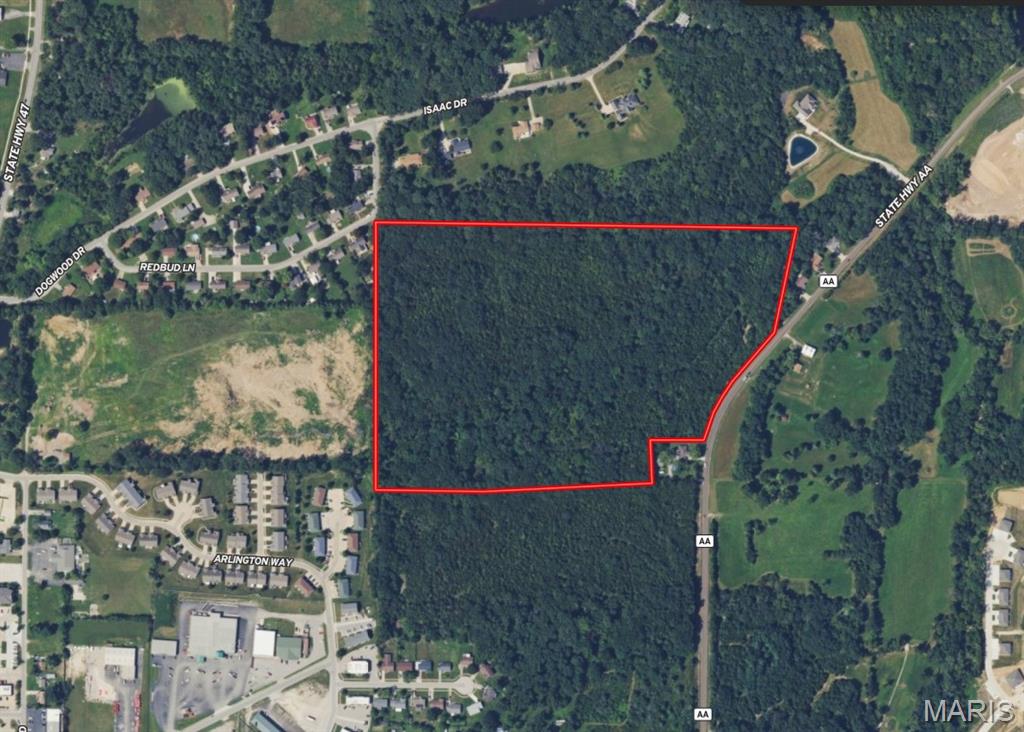 PRIME LAND!!! Gently rolling wooded acreage within city limits offering exceptional development potential. Ideal opportunity for residential development, estate lots, private estate, or a mixed-use recreational investment. Excellent topography with a potential lake site. Public water & sewer access available. Convenient location just minutes from shopping, dining, and quick access to I-70, providing strong appeal for future growth and accessibility.
