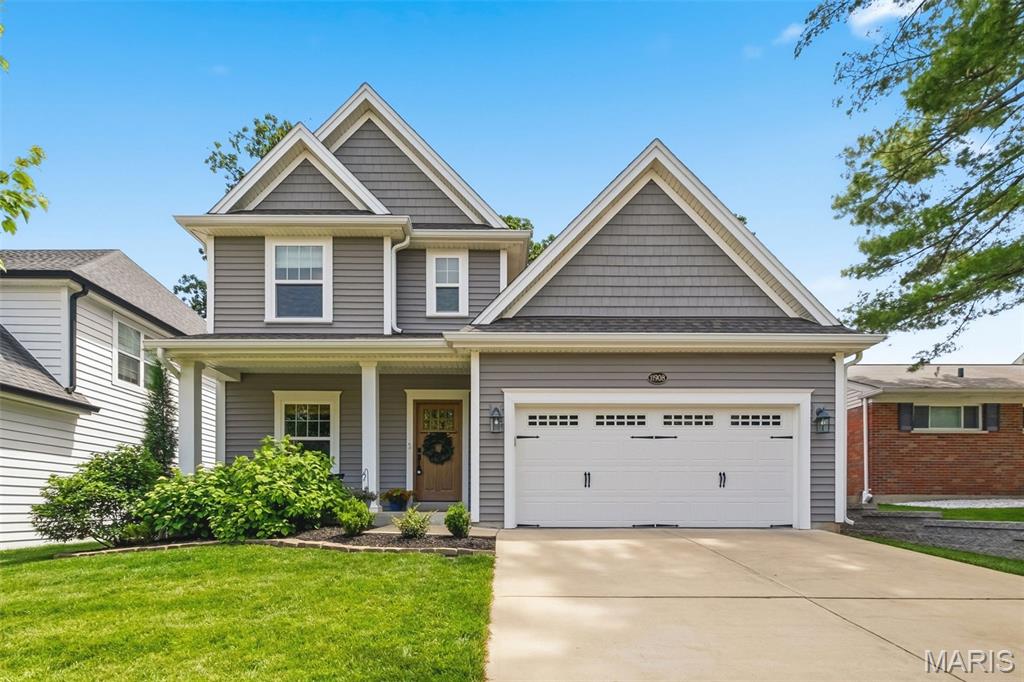 Luxury living meets everyday comfort in this stunning 4 bed, 3 1/2 bath home in the heart of Des Peres and located within the highly sought after Kirkwood School District, just steps from Pioneer Park! From the moment you step inside, you will love the bright, open floor plan, rich hardwood flooring throughout the main and second levels, and the thoughtful custom finishes throughout. The formal dining room is currently styled as an elegant cocktail lounge featuring custom wainscoting and an in-wall TV setup that remains with the home.
The spacious kitchen is a showstopper with an oversized quartz island, subway tile backsplash, stainless steel appliances, gas range, custom pantry with wine fridge, and a large breakfast nook with built-ins perfect for a coffee bar. The inviting family room features a gas fireplace, in-ceiling speakers, and overlooks the screened in porch complete with all weather flooring, roller shades, and a convenient doggie door.
Upstairs, the luxurious primary suite offers tray ceilings, a private balcony, and an incredible spa-like bath with a massive walk-in shower featuring double shower heads and dual vanities. The second floor laundry room adds everyday convenience, while two guest bedrooms share a spacious full bathroom.
The finished lower level includes the fourth bedroom, a full bathroom, and an expansive recreation space perfect for an additional family room, media room, game room, home gym, or entertaining area.
Additional updates and highlights include: whole house humidifier (2018), improved drainage system with buried downspouts (2022), in-ceiling speakers (2024), water heater expansion tank (2024), new garage door and keypad (2025), fresh paint throughout (2025), new dishwasher (2026), new carpet runner and basement stair carpeting (2026), back porch stained (2026), and professionally updated landscaping with transferable warranty through April 2027. Conveniently located near shopping, restaurants, major highways. This exceptional home truly has it all Welcome home!