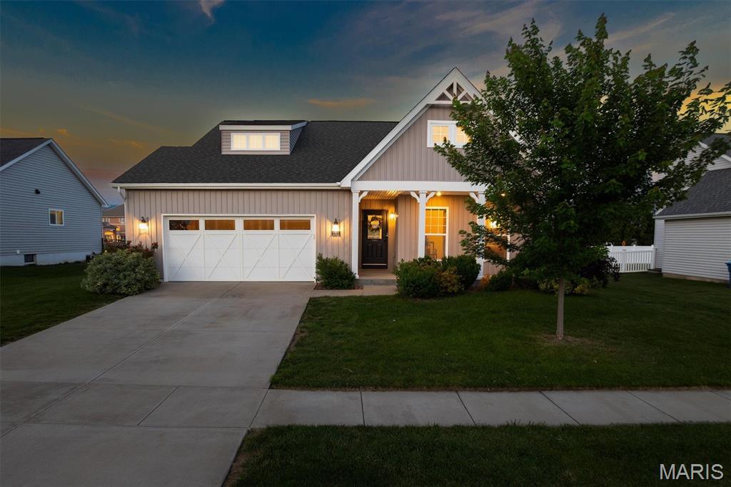 Welcome to Sullivan Meadows! This beautifully maintained ranch home offers 4 bedrooms, 3 full bathrooms, and a thoughtfully designed non-standard Whitney floor plan. The inviting entry features custom board-and-batten accents, while the spacious living area showcases coffered ceilings, durable LVP flooring, and a cozy fireplace. The kitchen is equipped with a gas stove and flows seamlessly into the open living and dining spaces. The primary suite offers a walk-in closet and private bath, while pocket doors throughout add both character and functionality. The finished lower level provides additional living space, a bedroom, a full bath, and plenty of room for entertaining, working, or relaxing. Enjoy the fenced backyard, extended garage, Ring doorbell, smart thermostat, and security system. Additional features include a radon mitigation system and a sump pump for added peace of mind. Conveniently located near shopping, dining, highways, and Scott AFB, this home combines comfort, style, and practicality in one exceptional package.