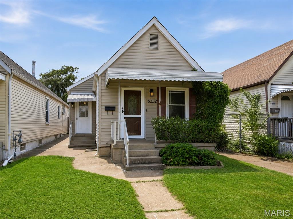 Welcome to this charming, updated brick bungalow in the heart of St. Louis’ historic Hill neighborhood! This move-in-ready 2-bedroom, 2 Full-bath home offers 1,062 sq. ft. of freshly painted living space, newer flooring, insulated tilt-in windows, and plenty of classic Hill character. The beautifully updated kitchen features quartz countertops, stainless steel appliances, a convenient butler’s pantry, and a table area perfect for casual dining or entertaining. The refrigerator stays! Outside, enjoy a fully fenced backyard, covered back patio, and a detached 2-car garage. A cul-de-sac directly across the street provides additional parking and a convenient open area for play and outdoor activities. The recently painted walk-up basement provides excellent storage and future potential. Located within walking distance of The Hill’s popular restaurants, shops, and bakeries, with easy access to Forest Park, the Barnes Hospital Complex, Central West End, and Highway 40. A fantastic opportunity to enjoy the charm of The Hill with modern updates and low-maintenance living!