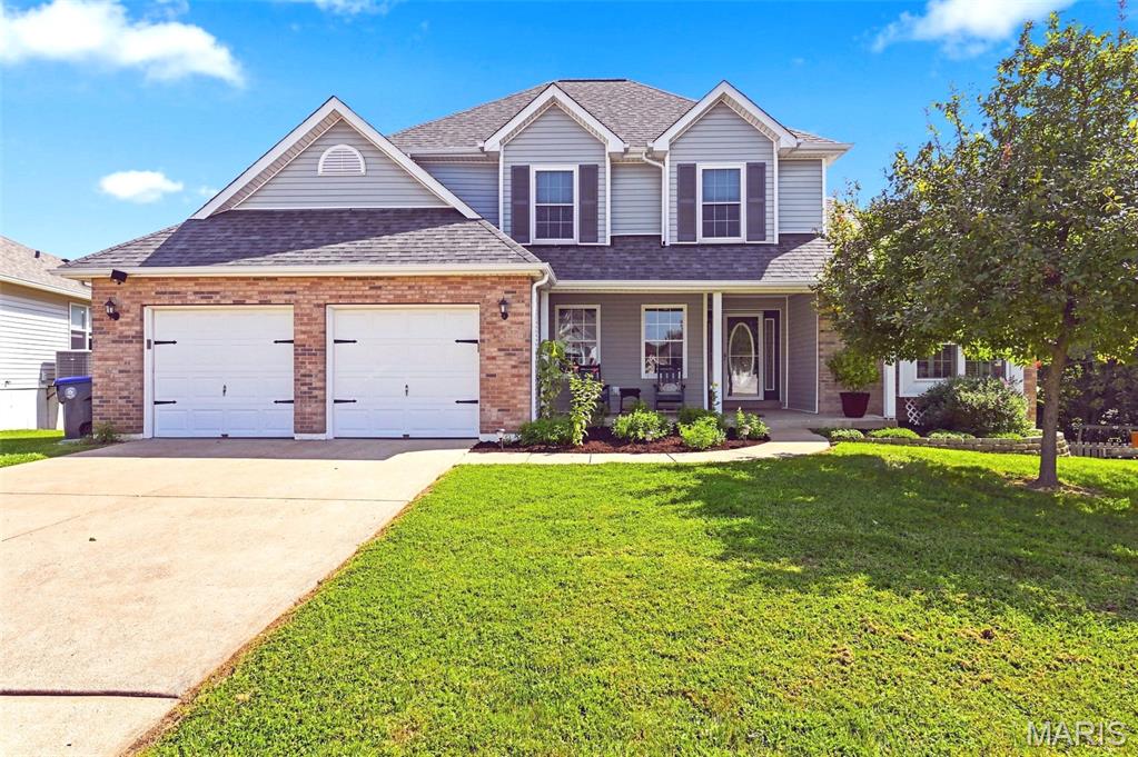 Welcome to this updated 4-bedroom, 1.5-story home in the beautiful Canyon Creek subdivision, offering excellent access to Highways 364, 70, and 40/64. This property features a main-level primary suite with a coffered ceiling, a walk-in closet, and a luxury bath equipped with a separate tub and shower. The main level also has a guest half-bath, a spacious dining area with new ceramic tile (2025), and Brazilian Cherry hardwood flooring throughout in the family room, kitchen/breakfast rm, and primary bedroom. Kitchen has a vaulted ceiling, granite countertops, a pantry, and an included refrigerator (2021). The adjoining breakfast room walks out to a spacious composite deck overlooking your large backyard that the kids will love and has a rear tree line for privacy. The main level family room features a gas fireplace with a new starter and logs (2026). Also enjoy the finished lower level, with walk-out, that includes a rec-room, bonus room, and possible sleeping area. The walk-out leads to a covered patio with under-deck roofing for all-weather enjoyment. Storage shed at rear of home. Piano, drink fridge in the lower level will stay. Grill on back patio stays as well. Major systems and updates: roof 2016 - HVAC (Furnace/Air) 2018 - deck 2018 - patio concrete 2022 - chimney chase 2026. Appliances: dishwasher, disposal, and smooth-top electric range 2021. Washer and dryer are included, new in 2026. Additional improvements: Upper-level flooring and baseboards 2020 and basement flooring 2019. The home is further equipped with a central vacuum system and a 200-amp breaker box. This home will provide you with many years of enjoyment!