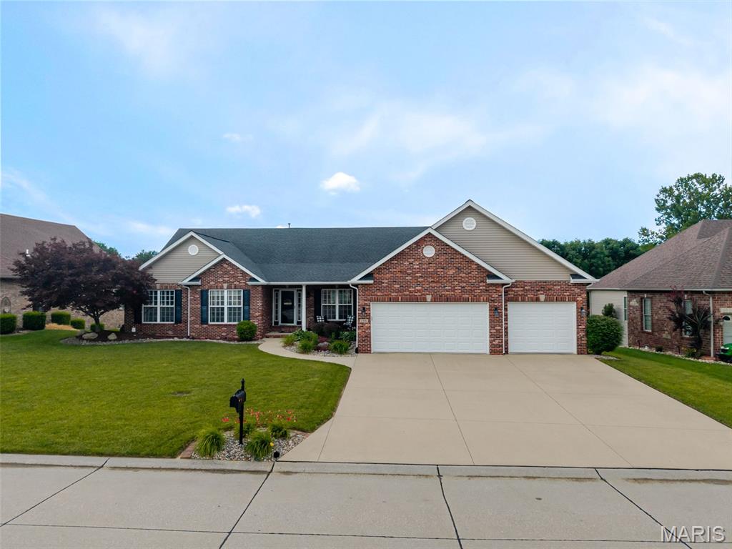 Welcome to 136 Stonebridge Crossing Drive in Maryville! This meticulously maintained 4 bedroom, 3.5 bath home offers the perfect blend of comfort, style, and functionality. The spacious kitchen features quartz countertops, a center island, ample custom cabinetry, and a large panty making it ideal for both everyday living and entertaining. The heart of the home is the inviting great room with a stunning double sided gas fireplace and a beautiful view to the backyard oasis. Just off the kitchen, the bright and airy Florida room provides the perfect quiet retreat to curl up with a good book and unwind at the end of the day.  The main level also features a formal dining room. The spacious primary suite offers a relaxing escape, complete with a private en suite bath featuring a separate shower and luxurious jacuzzi tub. Additional bedrooms provide plenty of space for family and guests. The walk-out lower level leads directly to the in-ground saltwater pool, complete with new pump, liner, and salt generator. A composite deck overlooks your own backyard paradise. The finished lower level offers a large family room with wet bar, a fourth bedroom and a non-conforming sleeping area or bonus room. Ample storage space and a dedicated workshop area with a workbench add even more functionality.
From the thoughtfully designed living spaces to the incredible outdoor amenities, this move-in-ready home has been lovingly maintained and is ready for its next owner to enjoy. Call your favorite realtor for your private showing today. All information including but not limited to square footage, room measurements and lot size should be independently verified.