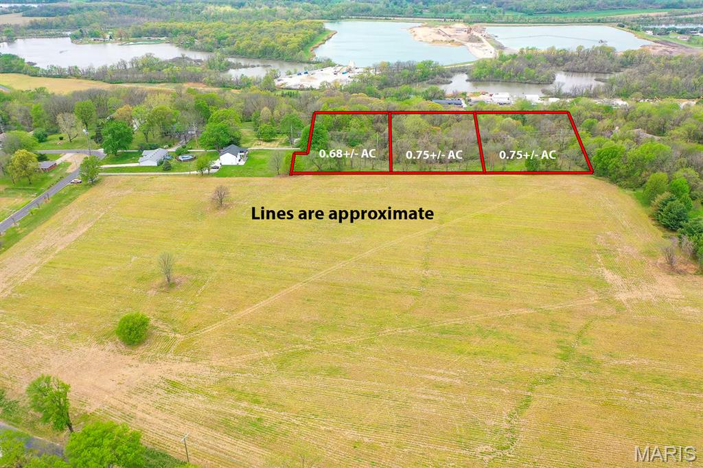Great opportunity to build your dream home on 2+ acres (3 lots) with no restrictions!  Extremely private and secluded, with several options for your choice of home design, but would be ideal for a walk-out.  Utilities available, septic is allowed per Madison County.  City of Collinsville requires buyer to extend the current 'road' to Lot 3 (specific details available upon request)  PLEASE DO NOT DRIVE ON MABRY ROAD, IT'S A PRIVATE DRIVE.  Use the paved road parallel to Mabry, below the tower.