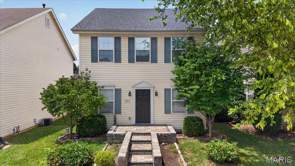 Outstanding 2 story traditional home in popular Lake St Louis Saratoga development with good curb appeal including new front door and re-laid stone entry steps and porch.   Excellent highway and shopping access. 3 BR and 2.5 baths.   Enter to dining room on the right and living room on the left.  This is the largest floor plan in the subdivision and has wonderful open kitchen/ family (hearth) room with gas log fireplace and extended kitchen w peninsula/breakfast bar and so much extra gleaming granite counter top & 42 inch cabinetry.  Kitchen has SS appliances and including gas range, new microwave, dishwasher and refrigerator (included). Sunroom/flex room between kitchen and garage has door to gazebo covered patio with natural gas grill (included). Great primary suite with large bathroom and big walk-in closet.  Laundry room second floor. 2 car attached garage rear entry.  Basement has some flooring for rec room or hobby area and unfinished storage also.   WATER SOFTENER ( leased).  CENTRAL VACUUMING SYSTEM.  NEW ROOF 2025, HVAC 2022, WATER HEATER 2021.  WALLS FRESHLY PAINTED AND NEW CARPETING, NEW WINDOW BLINDS, SOME NEW LIGHTING.  CABLE AND FIBER FOR INTERNET AVAILABLE.  Move right in!  Nearby Hawks Ridge Park and Zachary's Playground is a huge bonus for area residents.  
NOTE: all measurements are rounded up or down to the nearest foot so they are not exact and some rooms are irregular and not exact rectangles.  Gas grill and refrigerator are included but not warranted.  Grill has natural gas line.  Refrigerator has non functional ice maker.