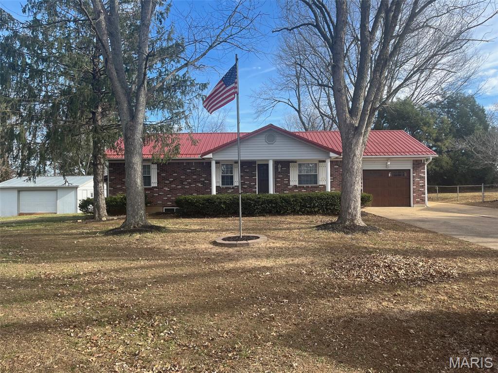 You must check out this beautifully completly remodeled home! This home features a total of 5 bedrooms,  2.5 bathrooms, family room, big laundry room, gorgeous new kitchen with quartz counter tops and all new appliances, new heating & cooling, hot water heater, attached 1 car garage and a bonus big detached garage. This one is a must see!