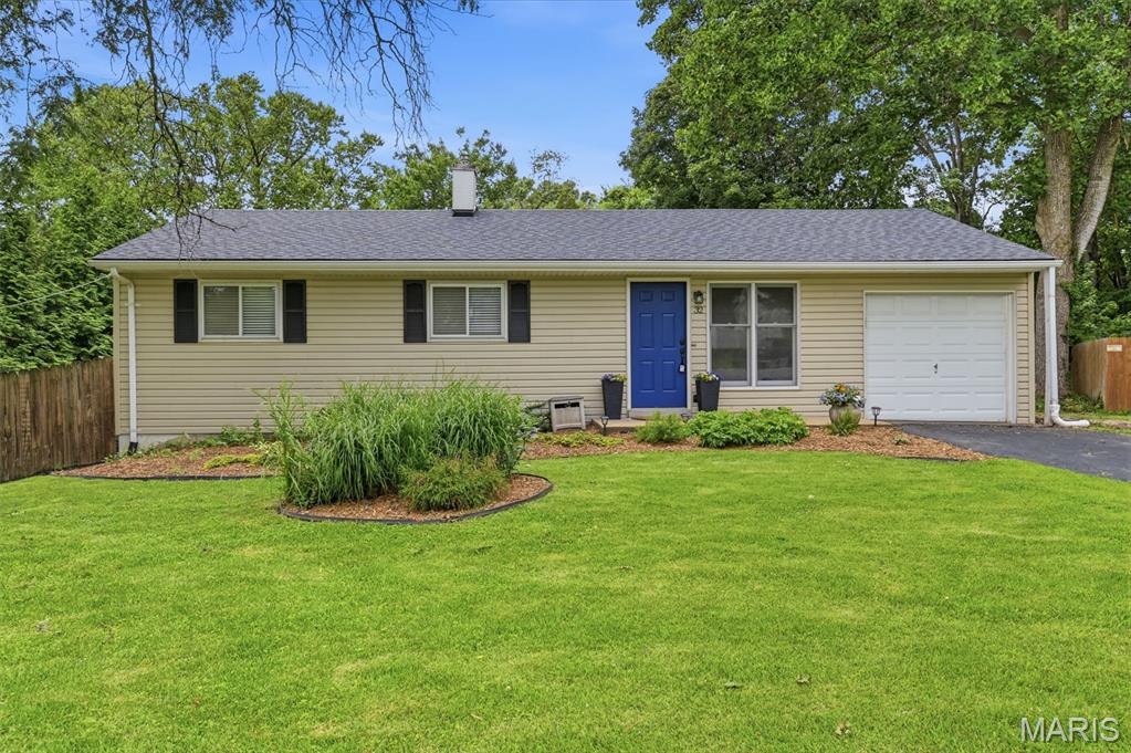Welcome to 32 West Meadow Lane in Ellisville! This beautifully updated 3-bedroom, 2-bath home offers 1,980 square feet of comfortable living space and is packed with recent improvements. Step inside to find hardwood floors throughout the main level, fresh paint, and a completely rehabbed main-floor bathroom. The kitchen has been refreshed with new countertops and a stainless steel sink, creating a clean and modern feel.

The finished lower level features brand-new carpet, providing additional living or recreation space. Major updates include a new roof and new electrical panel for added peace of mind. Outside, you'll appreciate the freshly painted deck, newly painted front door, and new landscaping in both the front and rear yards, enhancing the home's curb appeal. Situated on nearly half an acre, the property offers a secluded backyard with plenty of space to relax, entertain, or enjoy the outdoors in a private setting.

Move-in ready and thoughtfully updated, this Ellisville gem is ready for its next owner to call it home!