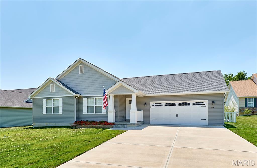 Welcome home to this beautifully maintained 4-year-old ranch in the desirable Stone Crossing subdivision! This 3-bedroom, 2-bath split-bedroom floor plan with over 1600 sq ft offers the perfect blend of comfort, style, and functionality.
Step inside to find durable luxury vinyl plank flooring throughout the main living areas, with cozy carpet in the bedrooms. The open-concept kitchen is designed for both everyday living and entertaining, featuring soft-close cabinetry, a large center island, an oversized pantry, and plenty of workspace. The spacious living room is highlighted by a warm gas fireplace that can heat the home in the winter, creating the perfect gathering space.
The private primary suite offers a relaxing retreat with a double vanity and a separate shower in the en-suite bath. A convenient main-floor laundry room adds to the home's practical layout.
Outside, enjoy the oversized patio overlooking the partially fenced backyard with attractive vinyl fencing—ideal for outdoor dining, relaxing, or entertaining. With modern finishes, a thoughtful floor plan, and a fantastic location, this move-in-ready home is one you won't want to miss!