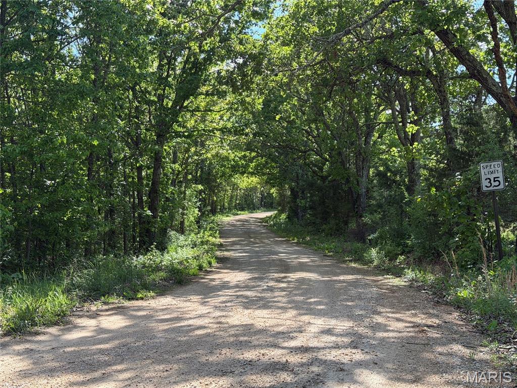 10 acres of pure Ozark adventure are waiting for their new owner! Whether you’re dreaming of a private hunting retreat, a peaceful place to explore, or the perfect setting to build your forever home, this versatile property offers it all—just minutes from Salem. This beautiful tract features marketable timber, including impressive stands of ancient white oak, red oak, and hickory. With multiple potential build sites, you’ll have your choice of private, scenic locations to create the home or cabin you’ve always envisioned. Access is easy with a well-maintained gravel road, only 3/10 mile off a chip-and-seal road. Outdoor enthusiasts will appreciate being just minutes from Shawnee Mac Lakes and Mark Twain National Forest, and only 30 minutes from both the Current River and the Meramec River—perfect for fishing, floating, and weekend adventures. Hunters will love the abundant deer and turkey that frequent the property. Property will be surveyed prior to closing. Additional adjoining tracts are available for buyers seeking larger acreage. A versatile, high-demand land opportunity in a growing recreational market.  The electric easement is being drawn up.