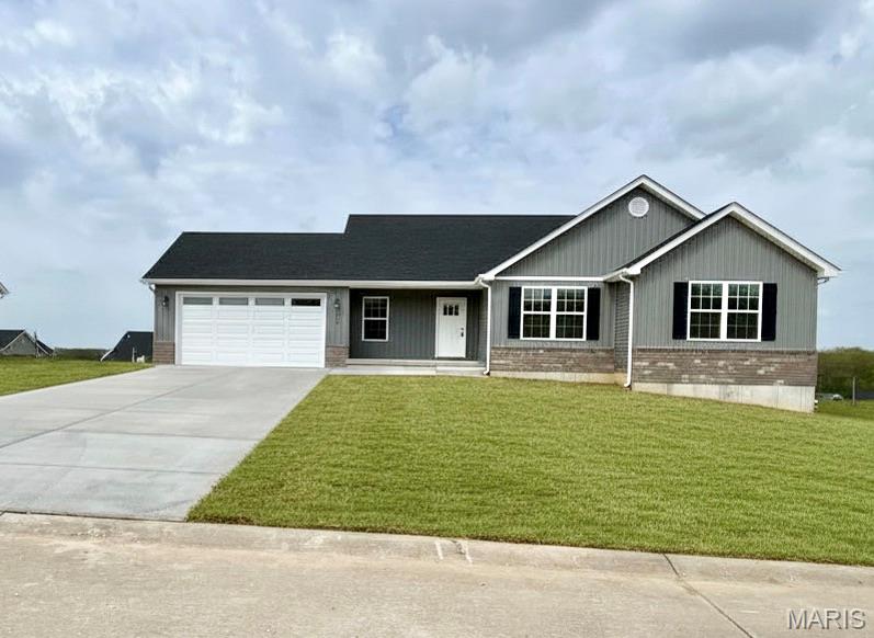 MOVE IN READY! NEW CONSTRUCTION! This stunning ranch home, located in a great subdivision, features an open-concept design with 3 bedrooms, 2 bathrooms, and main-floor laundry. The kitchen is beautifully appointed with custom cabinetry, quartz countertops, a tile backsplash, and a spacious island. Engineered hardwood flows through the kitchen, great room, laundry, and hallways, while the bathrooms feature luxury vinyl tile and the bedrooms are carpeted for comfort. The basement includes a rough-in for a third bathroom, offering future expansion potential. Now available!