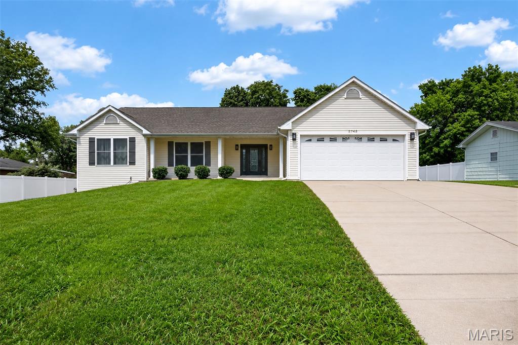 SHOWINGS START THURSDAY July 2nd!!! Don’t miss this beautifully maintained 3 bedroom, 3 bathroom vaulted ranch nestled on an oversized lot in the heart of St. Peters and located within the highly sought-after Francis Howell Central High School boundaries. This home offers the perfect combination of space, comfort, and convenience. Step inside to an open floor plan featuring soaring vaulted ceilings, beautiful hardwood floors throughout the main living areas, and an abundance of natural light. The spacious primary suite includes a private en-suite bath, while the convenient main-floor laundry makes everyday living effortless. Two additional bedrooms finish off the main floor. The fully finished lower level nearly doubles your living space with bright windows, a large family and recreation area, a bonus room, and a full bathroom ideal for entertaining, working from home, overnight guests, or multi-generational living. The basement also offers the rare convenience of access from both inside the home and directly through the garage. Step outside and imagine summer afternoons in your sparkling above-ground pool, backyard barbecues, and kids or pets enjoying the oversized yard. The extra-wide three-car driveway means there’s always room for family and friends to park when they come to visit. Located just minutes from shopping, restaurants, parks, and easy highway access, this exceptional home offers the space you’ve been searching for in St. Peters’. Schedule your private showing today. Homes with this combination of features, location, and value don’t stay on the market long!